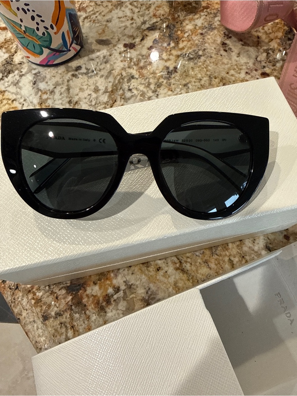 Prada Black Gloss Cat-Eye Sunglasses with Dark Lenses